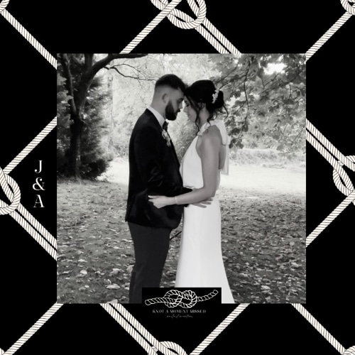 A couple stands close in an outdoor setting, surrounded by a decorative rope border.